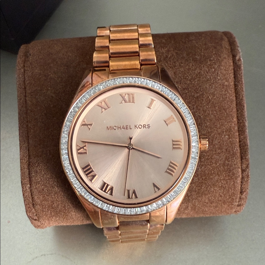 Michael Kors Rose Gold Roman Numeral Watch 150$
